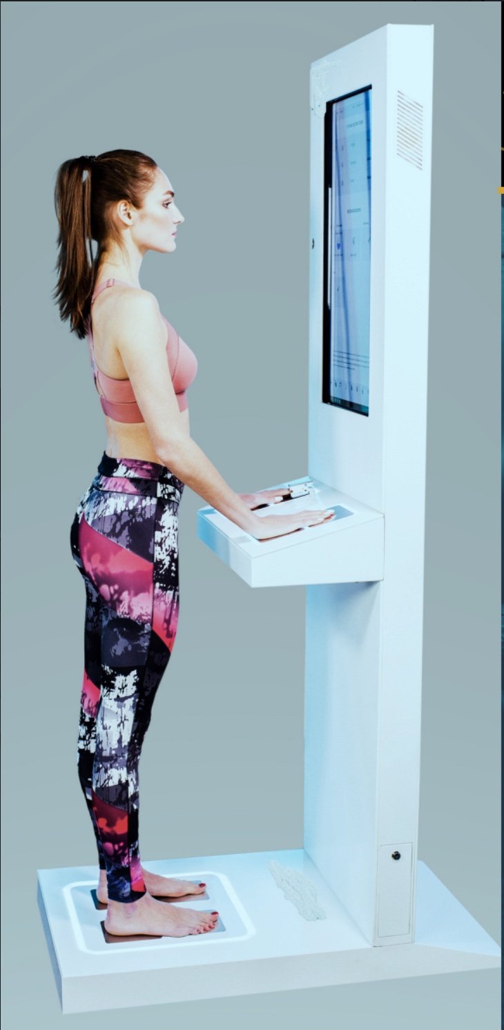 Woman getting a PUR Scan reading done on kiosk