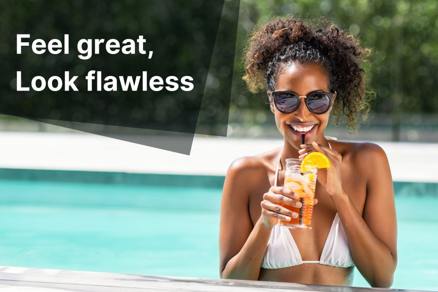 Woman in pool with drink with caption Feel Great Look Flawless