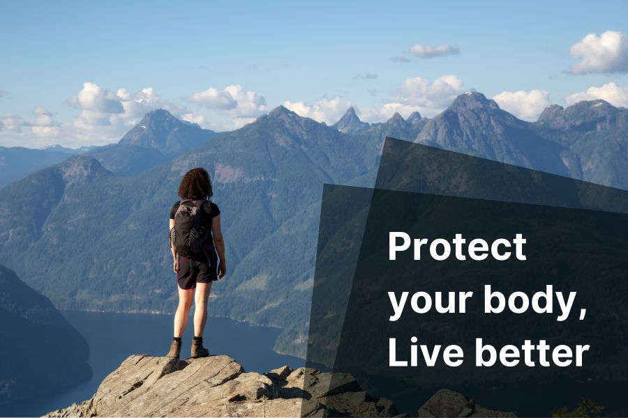 Woman hiking overlooking mountains with caption Protect your body Live better