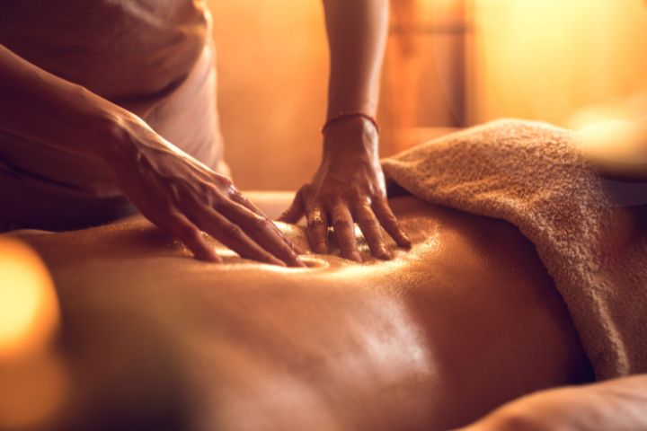 Man receiving Light Therapy in Red Light Therapy Bed